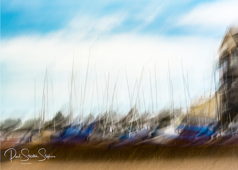 This is an ICM image taken from the shoreline of a sailing club where the boats are at rest.